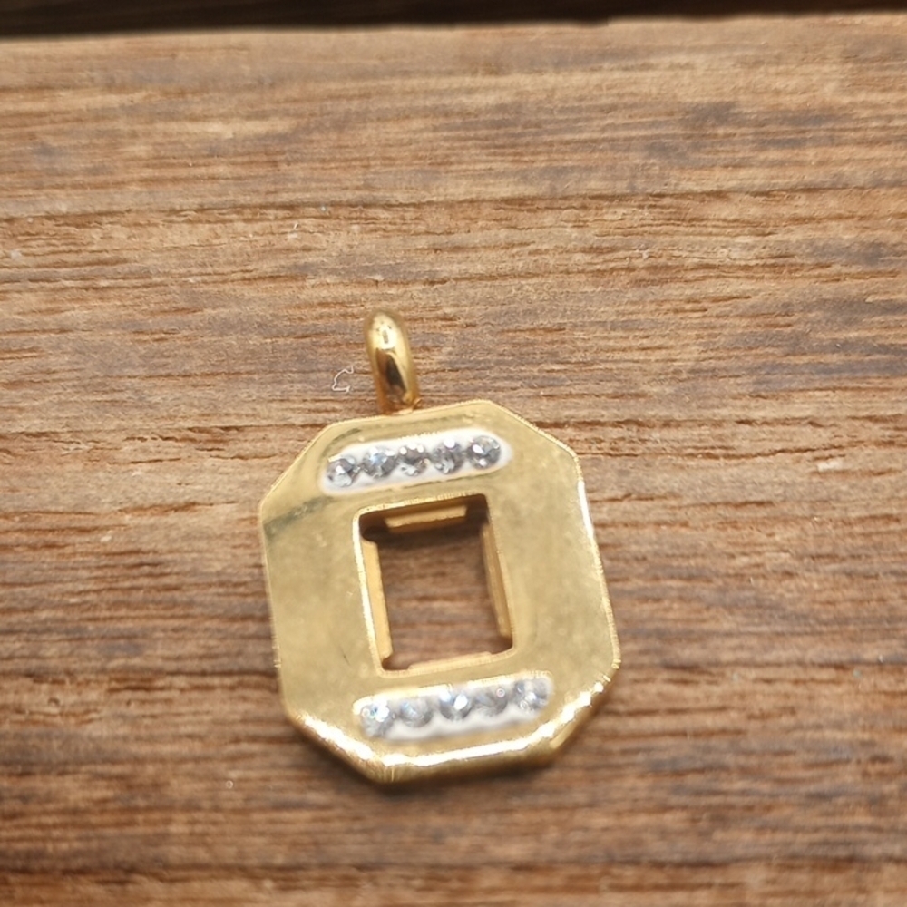 Elegant Gold Tone Openwork Pendant with Crystal Accents P244
